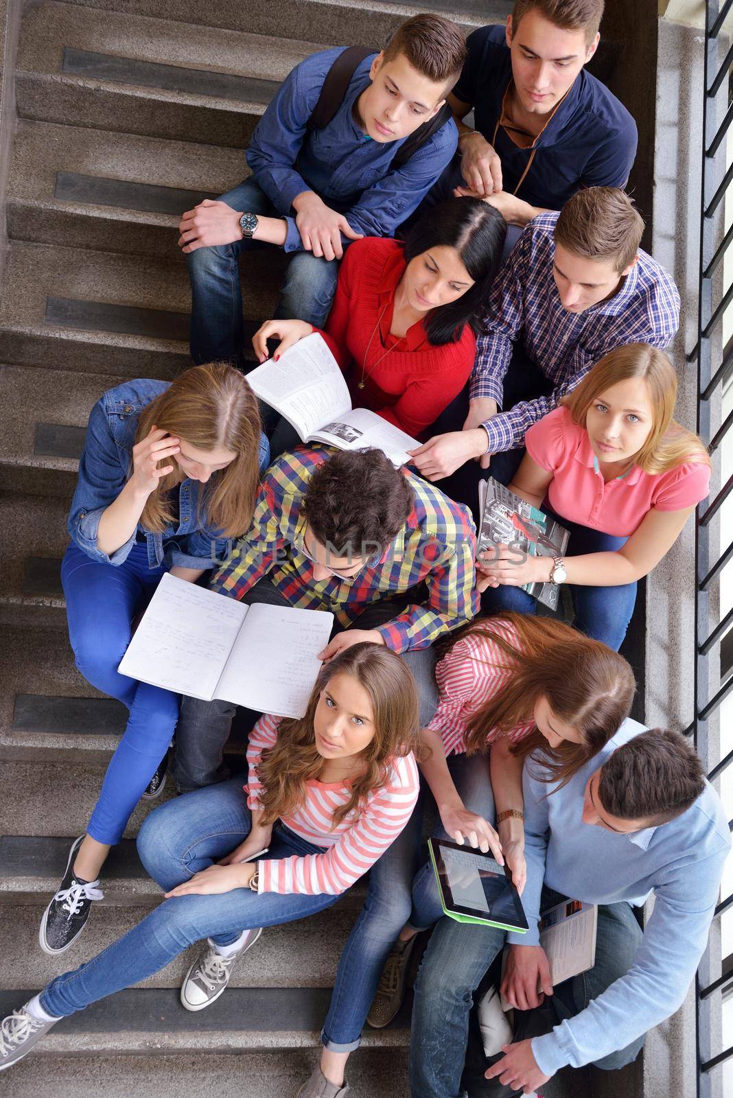 happy teens group in school by dotshock