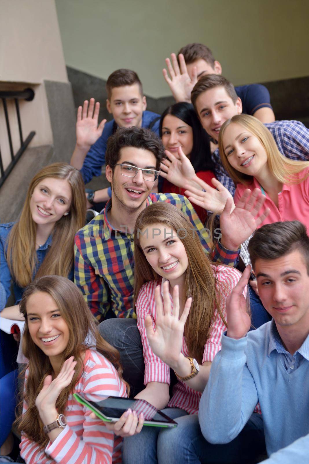 happy teens group in school by dotshock