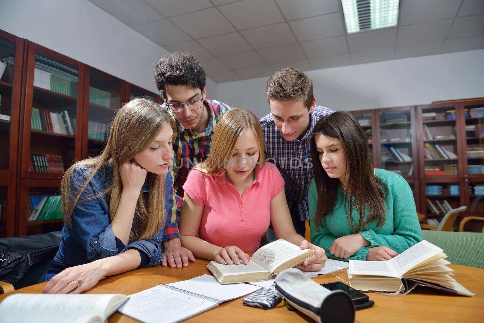 happy teens group in school by dotshock