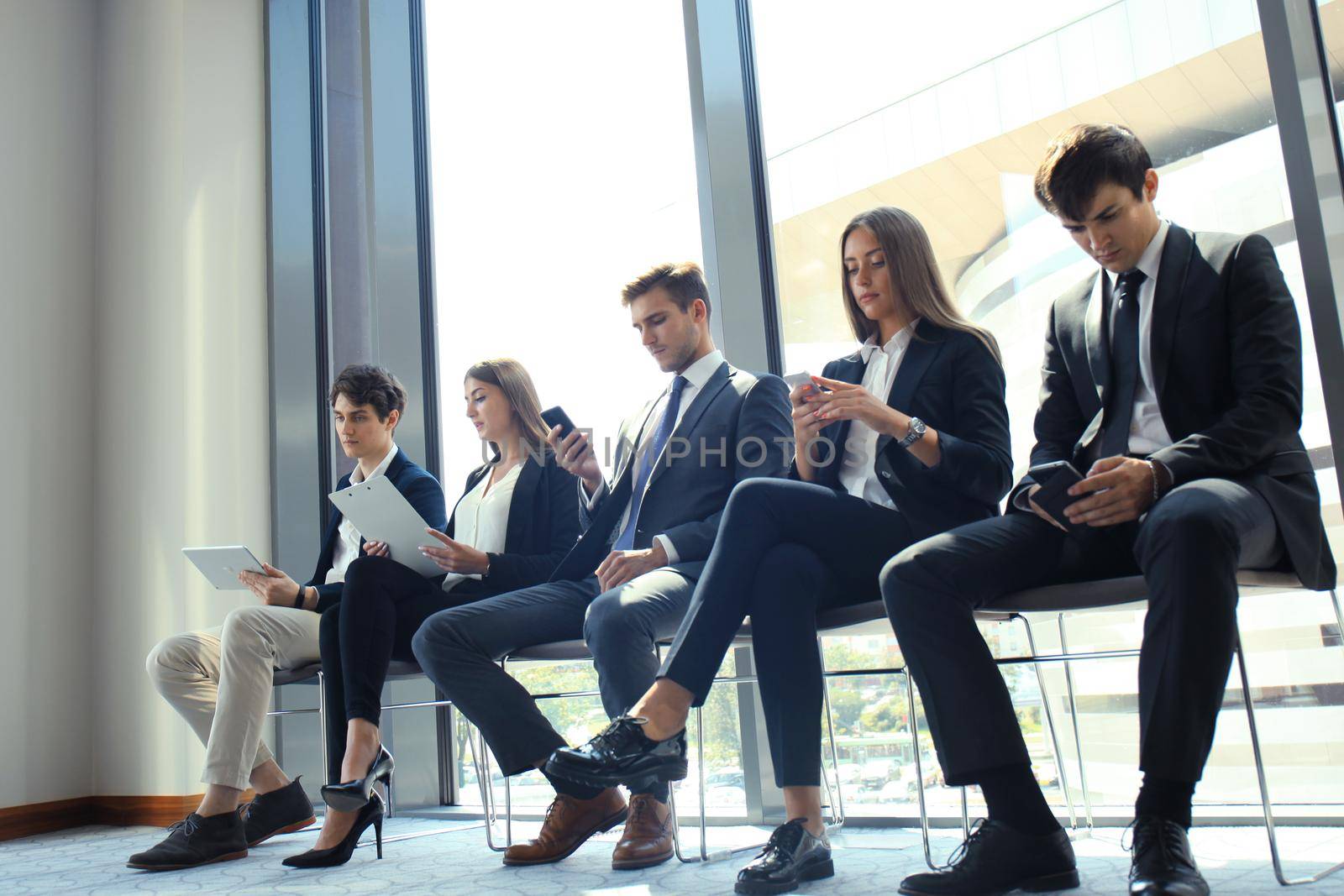 Business people waiting for job interview by tsyhun