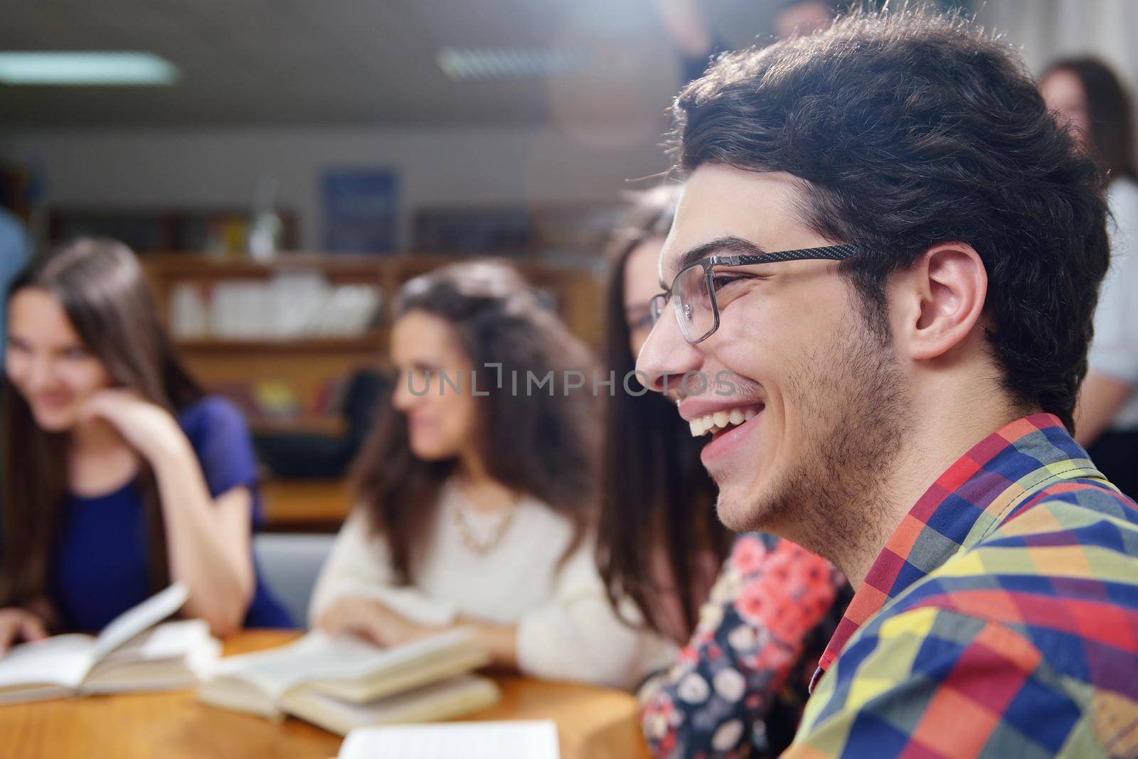 happy teens group in school by dotshock