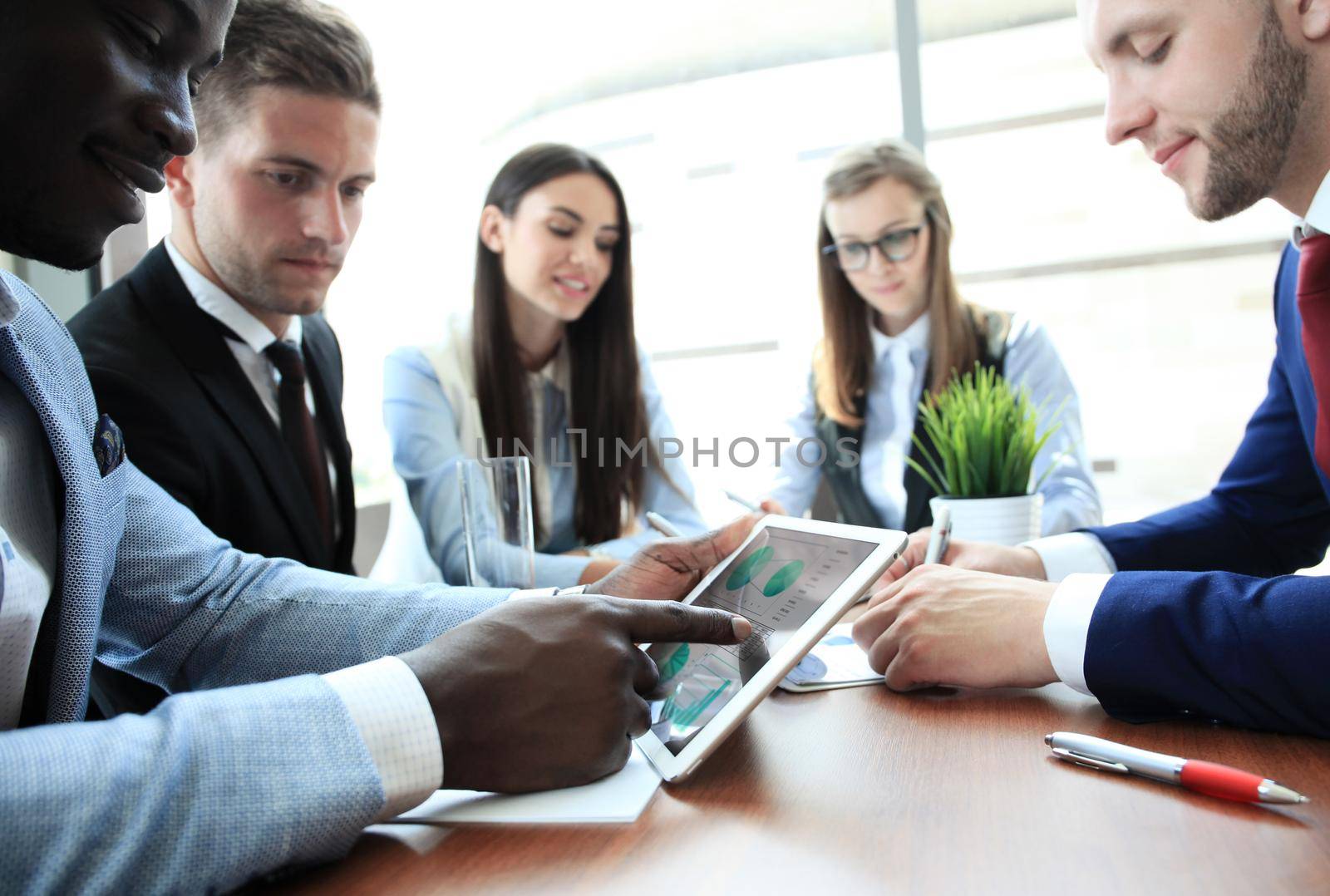 Business adviser analyzing financial figures denoting the progress in the work of the company