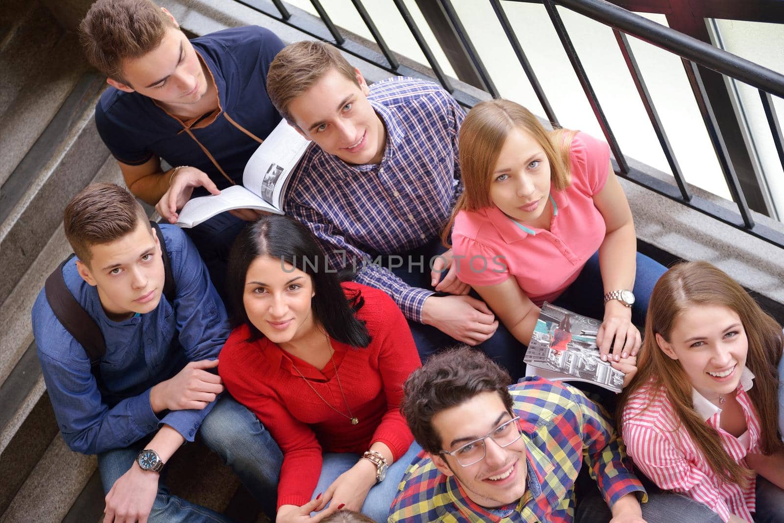 happy teens group in school by dotshock