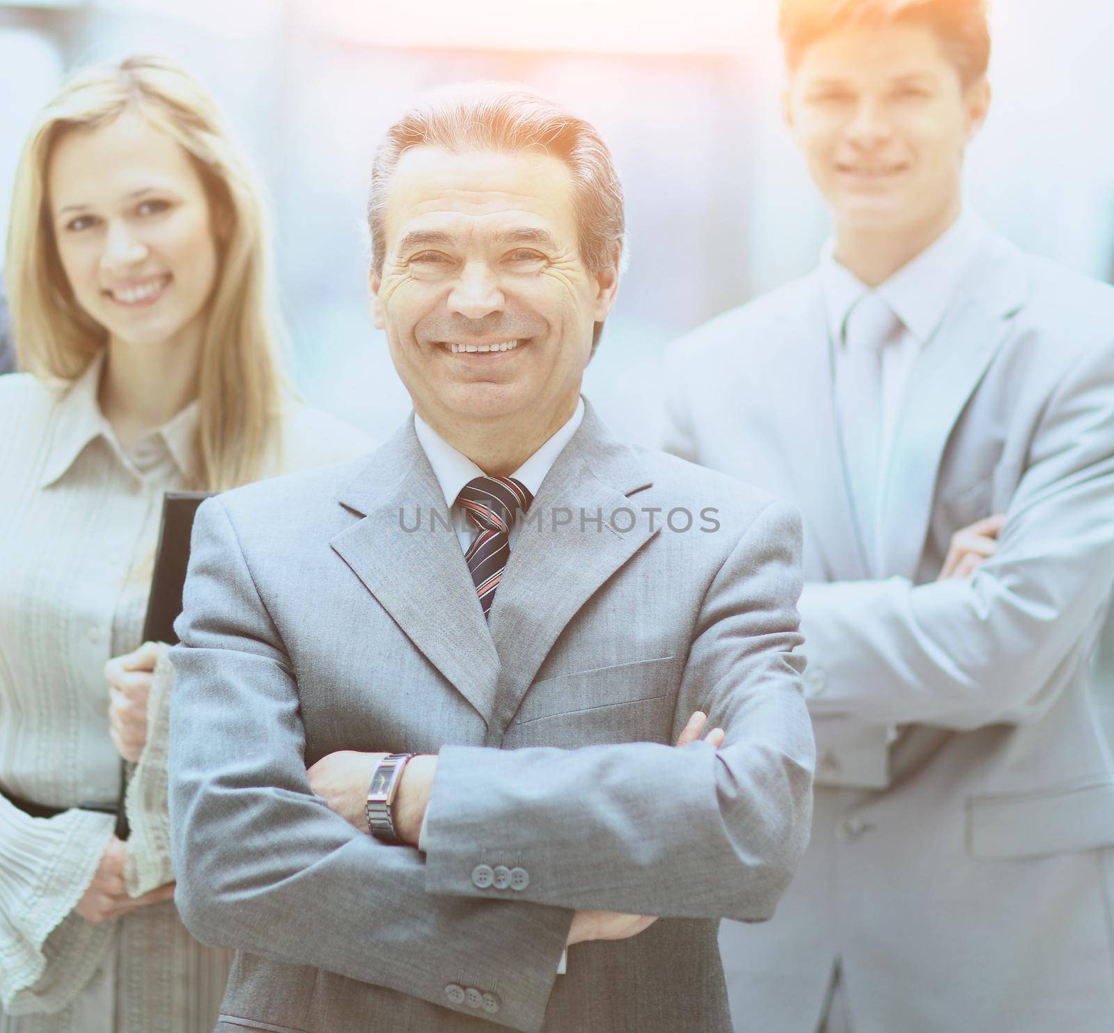 Group portrait of a professional business team looking confidently at camera