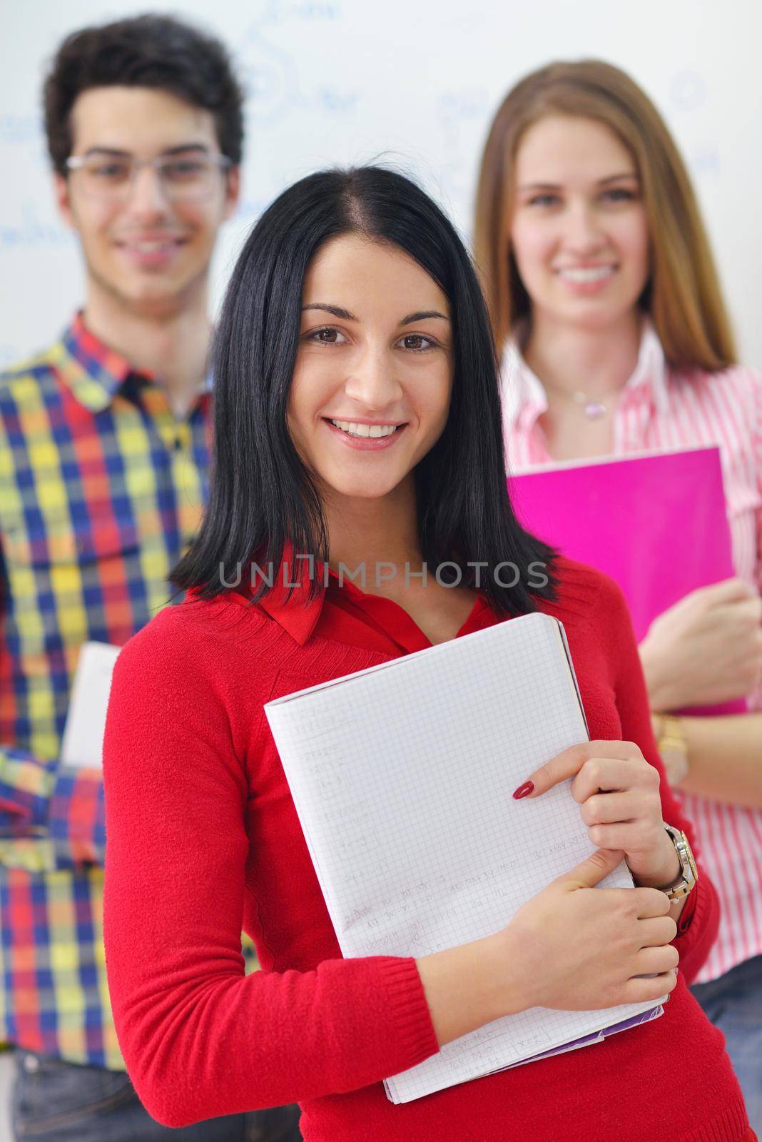 happy teens group in school by dotshock