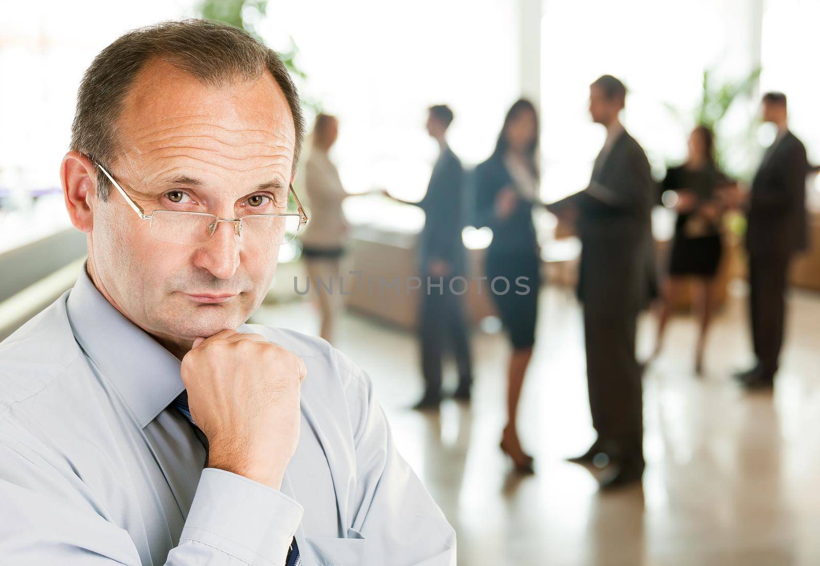 closeup of a psychologist consultant on the background of the office. the photo has a empty space for your text