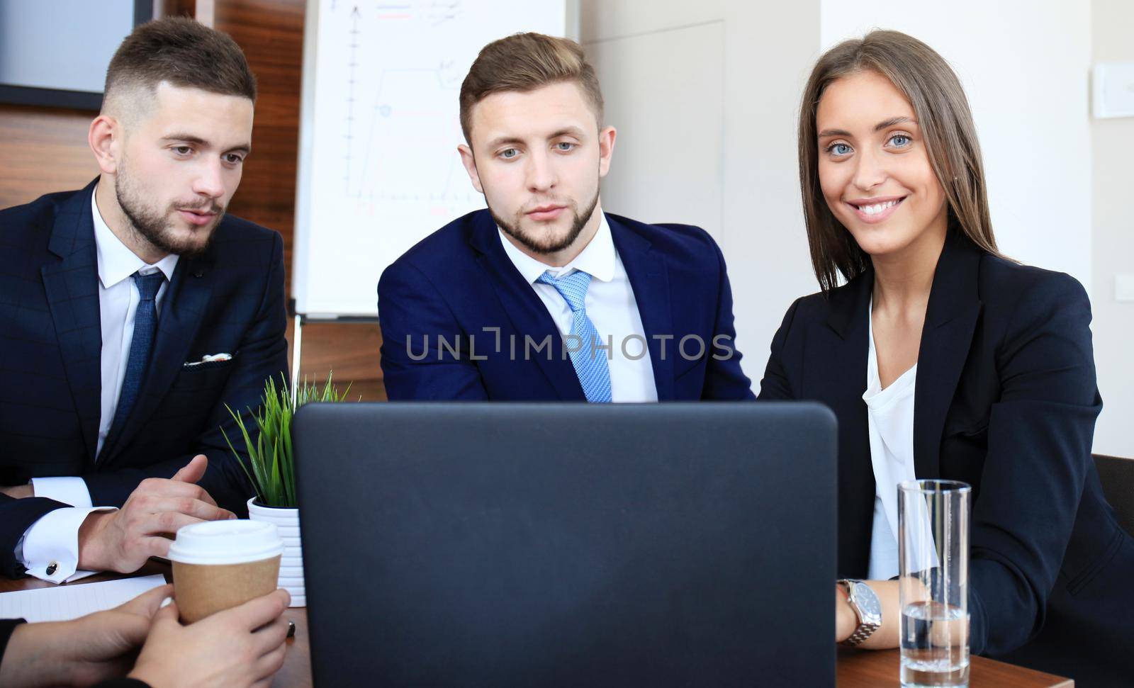 Business people working on new project at modern office