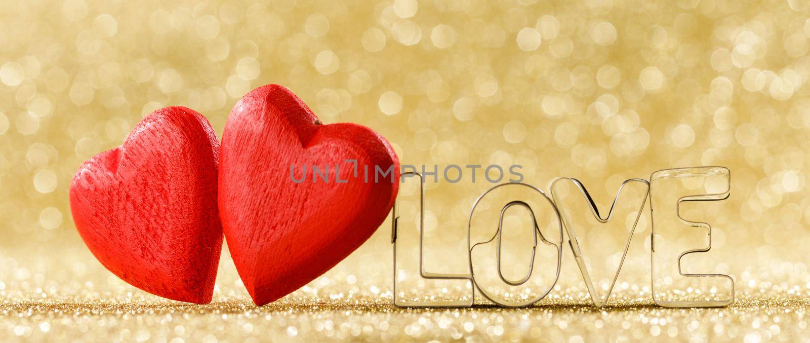 Red hearts on glitter background by Yellowj