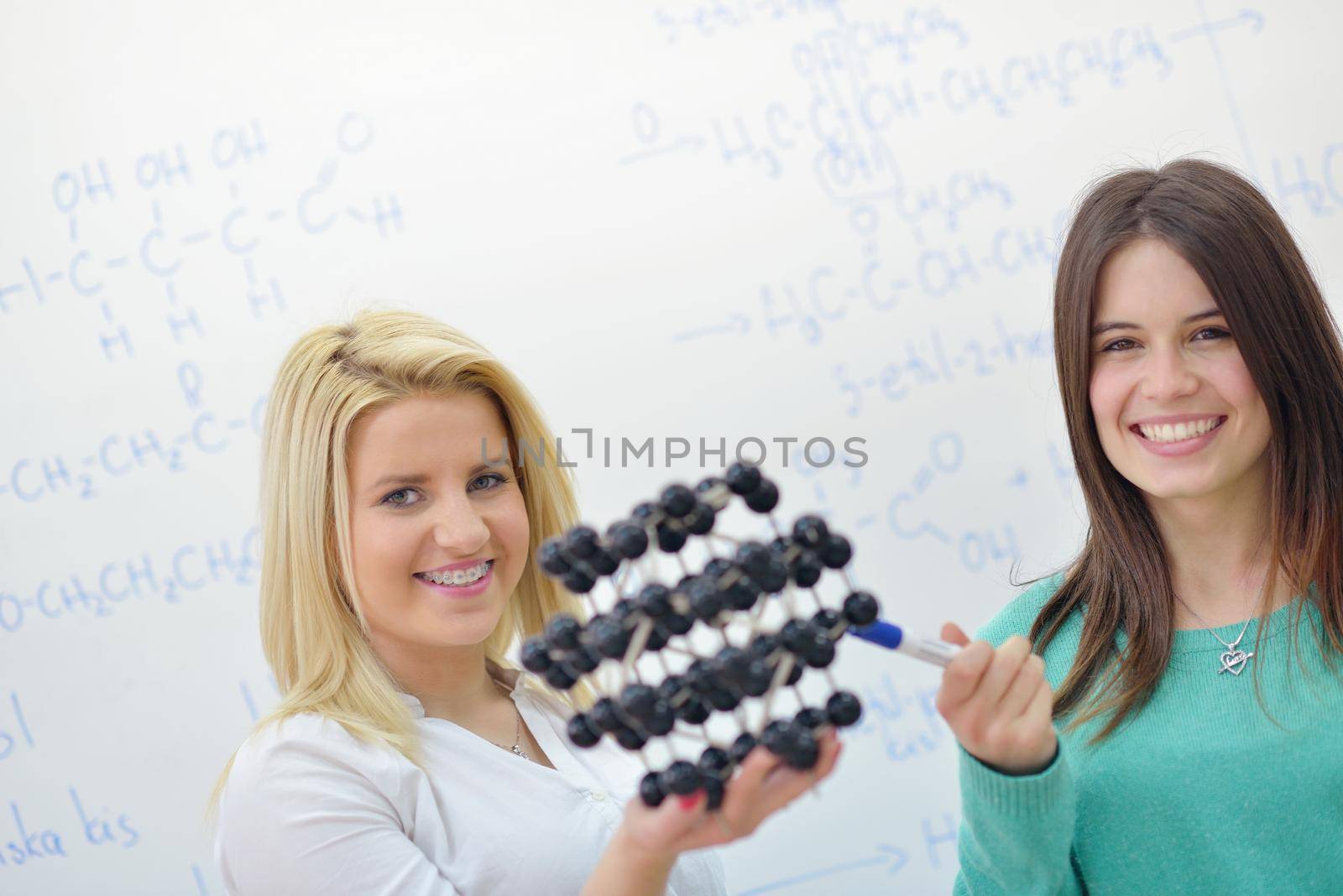 happy teens group in school by dotshock