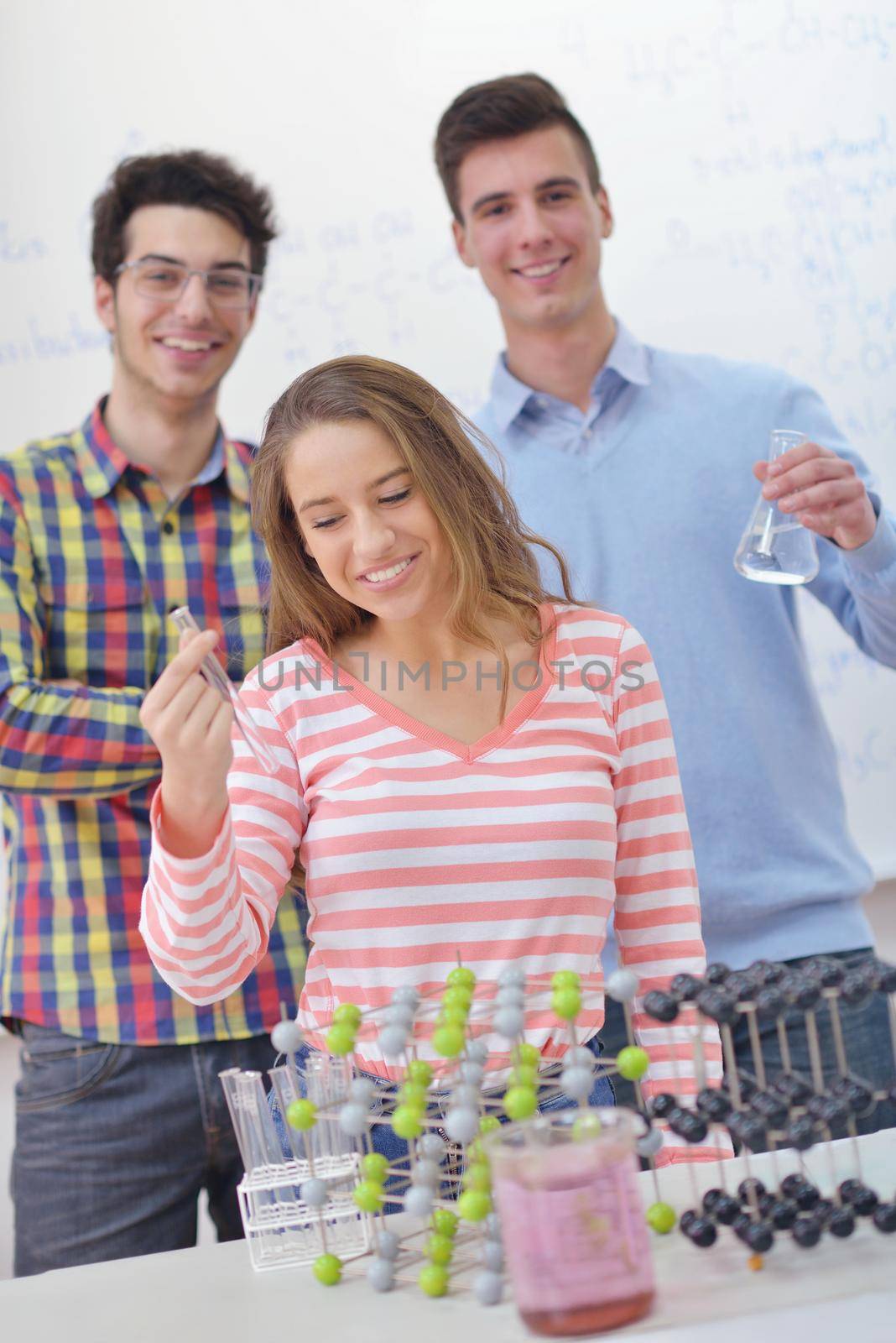 happy teens group in school by dotshock