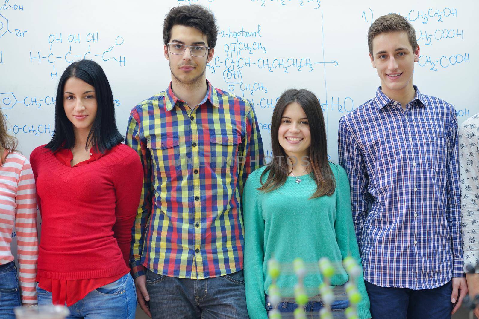 happy teens group in school by dotshock