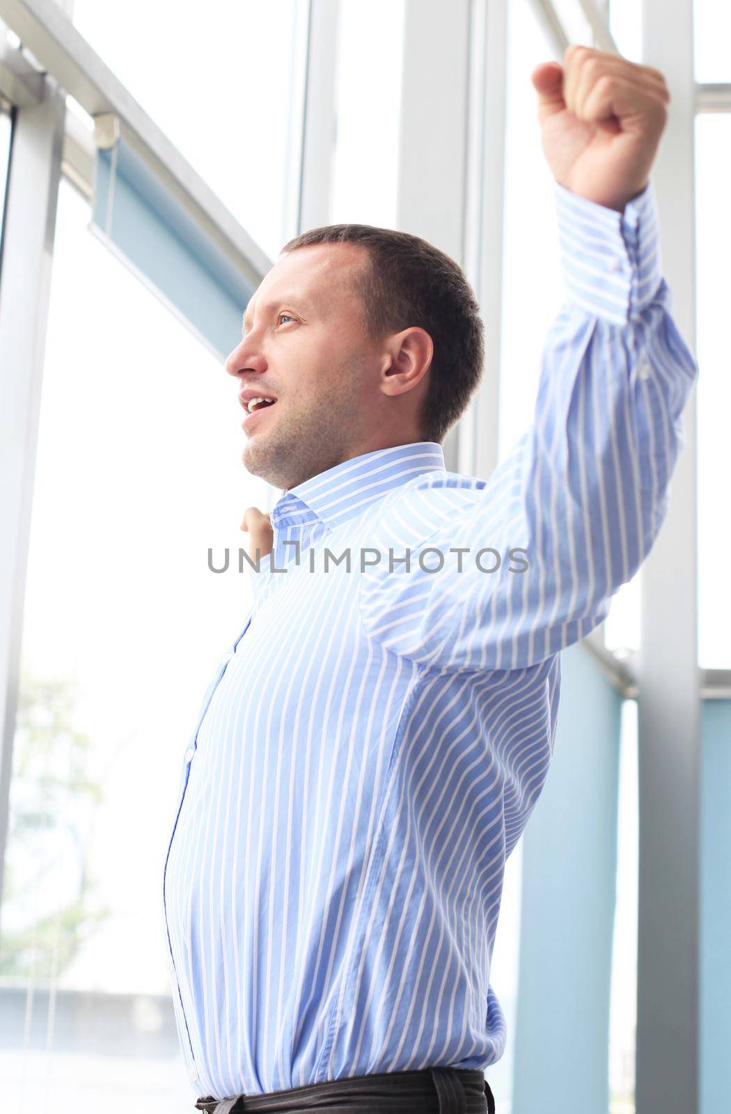 Portrait of a businessman looking at the window