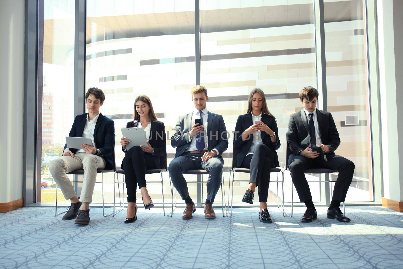 Business people waiting for job interview