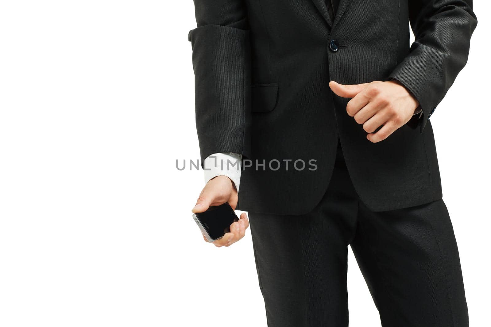 close-up of torso of man in suit and tie and modern smartphone in hand. photo on a white background. on the left side of the photo is blank for your text