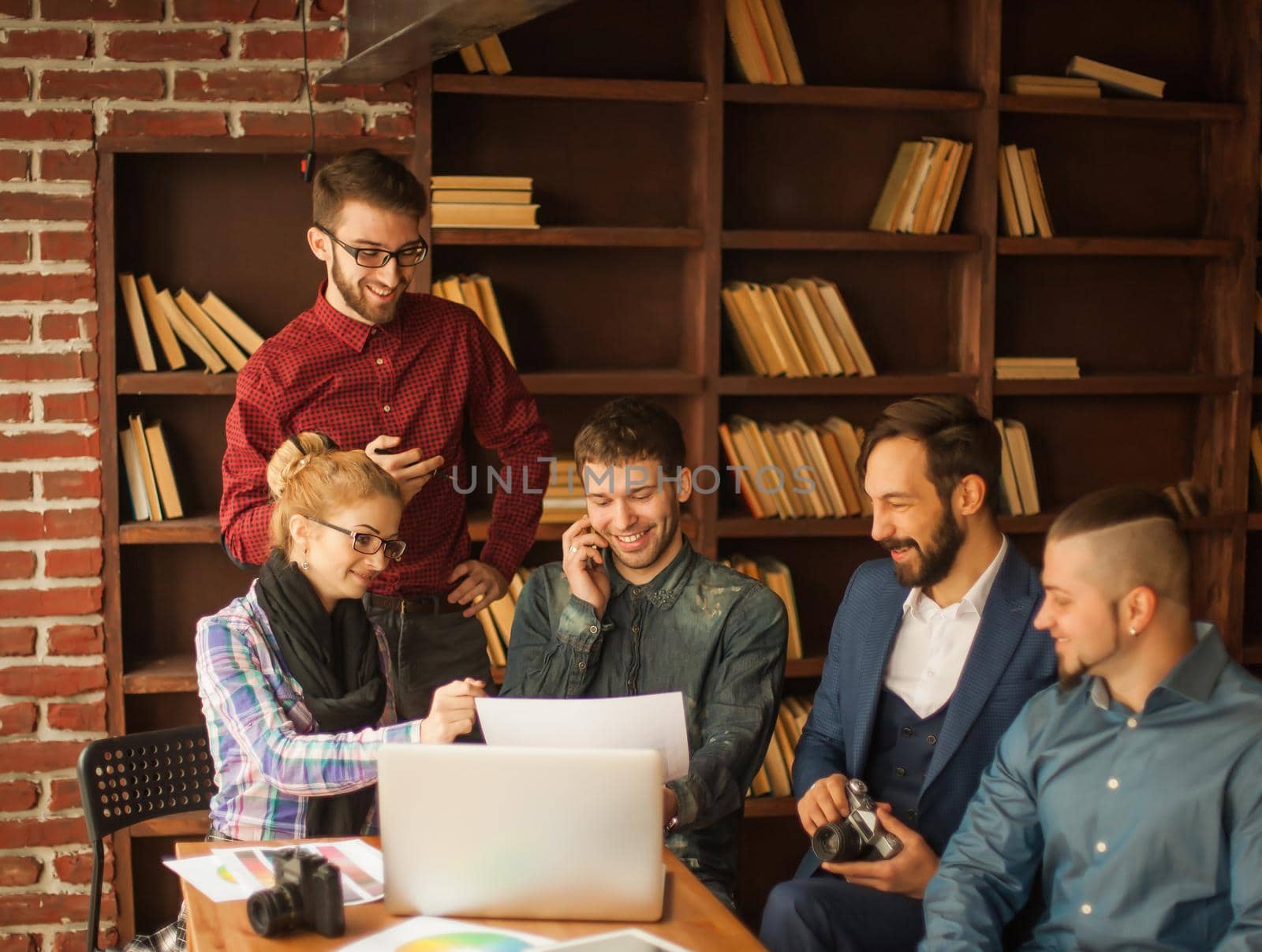 team of designers to develop new color palette in the workplace in a modern office