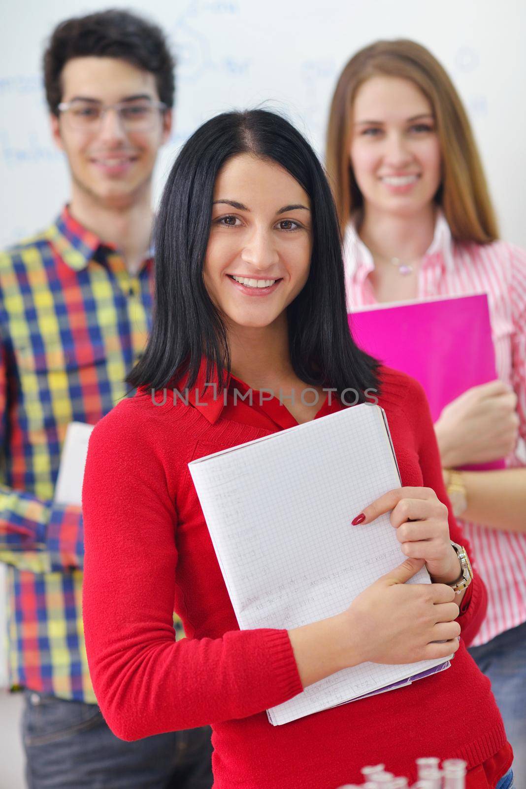 happy teens group in school by dotshock