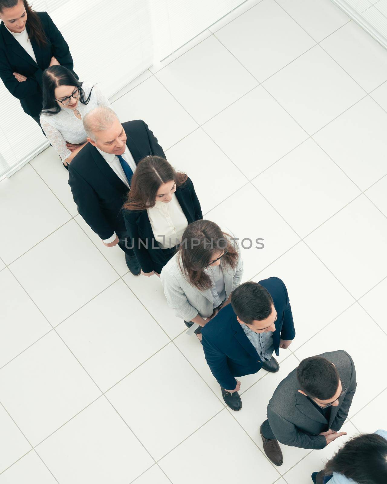 top view. diverse business of people standing in line for interviews. photo with a copy of the space