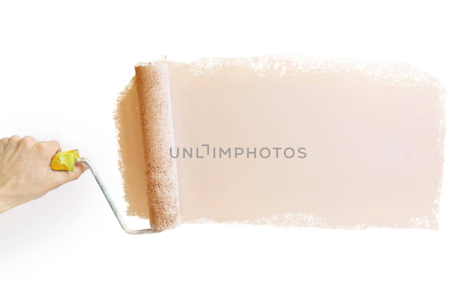 Hand holding a paint roller with a gray, drawn strip of gray paint for advertising copy, isolated on white background