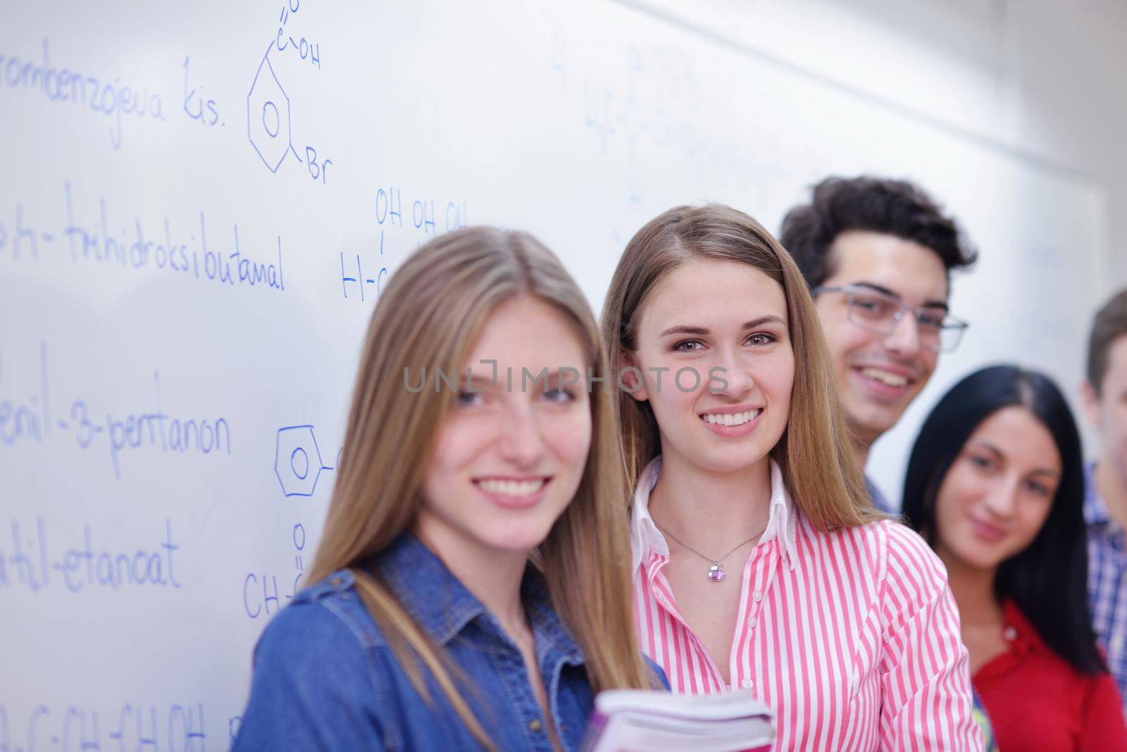 happy teens group in school by dotshock