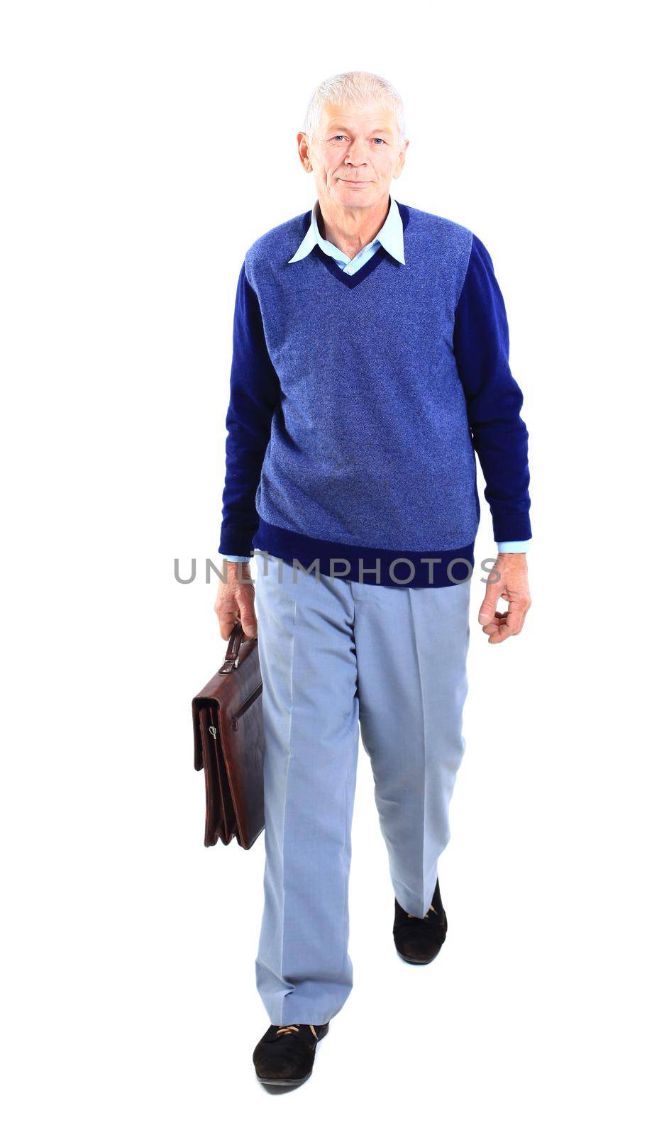 Full length of a happy senior man standing confidently on white background