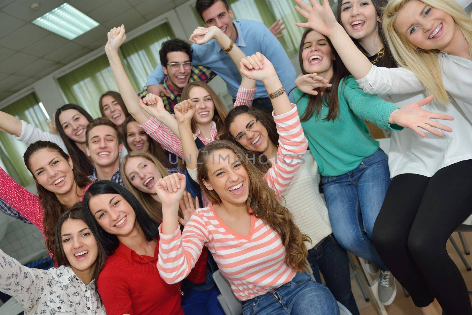 happy teens group in school by dotshock