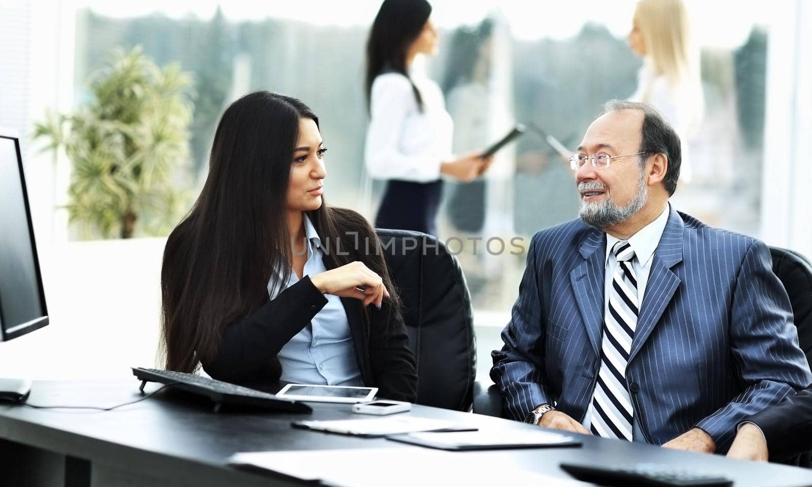 business team works with the financial documents in the office