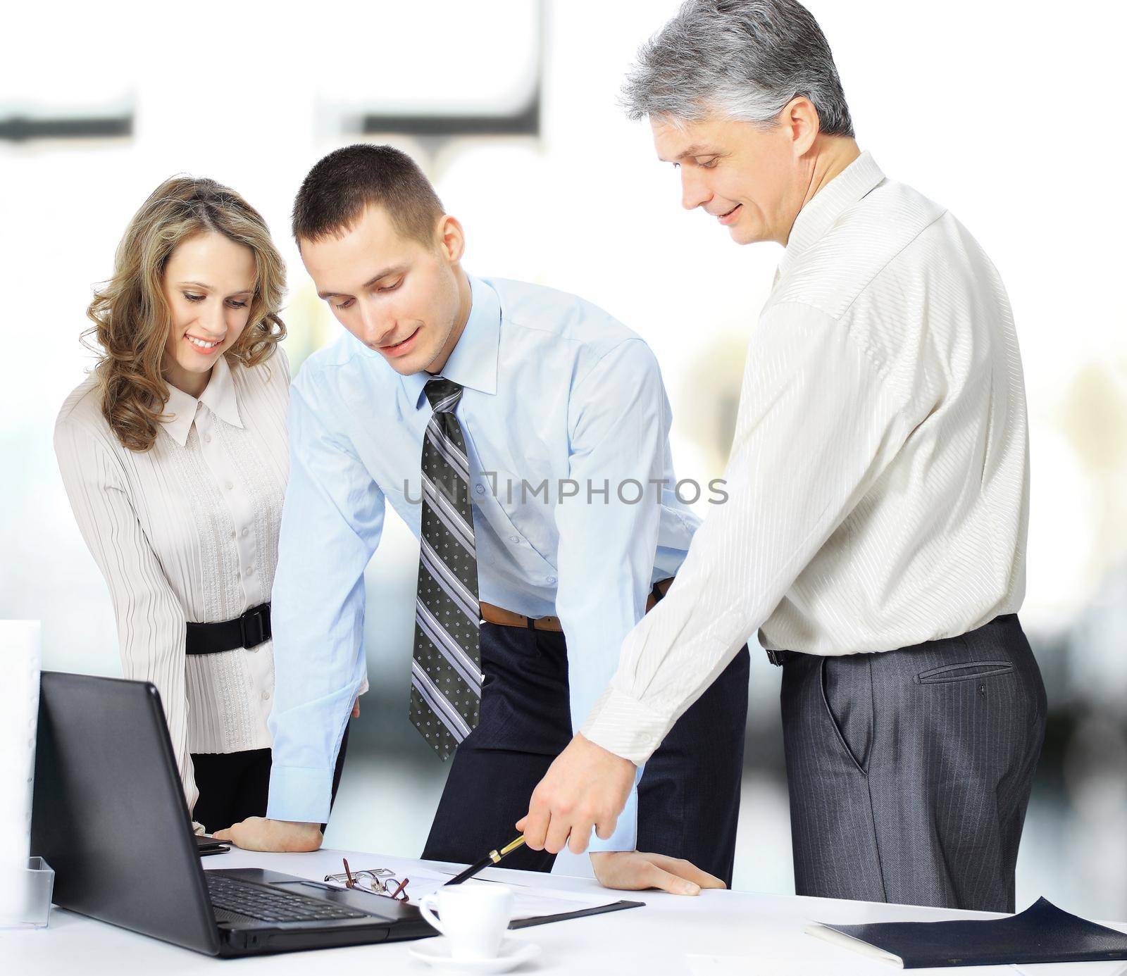 A group of businessmen discussing the policy of the company the office. by SmartPhotoLab