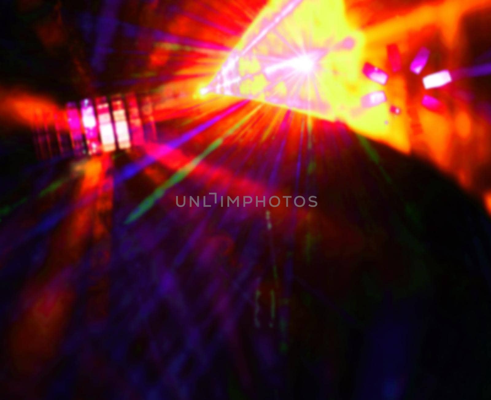 Lighting disco with bright beams of searchlight and laser show.