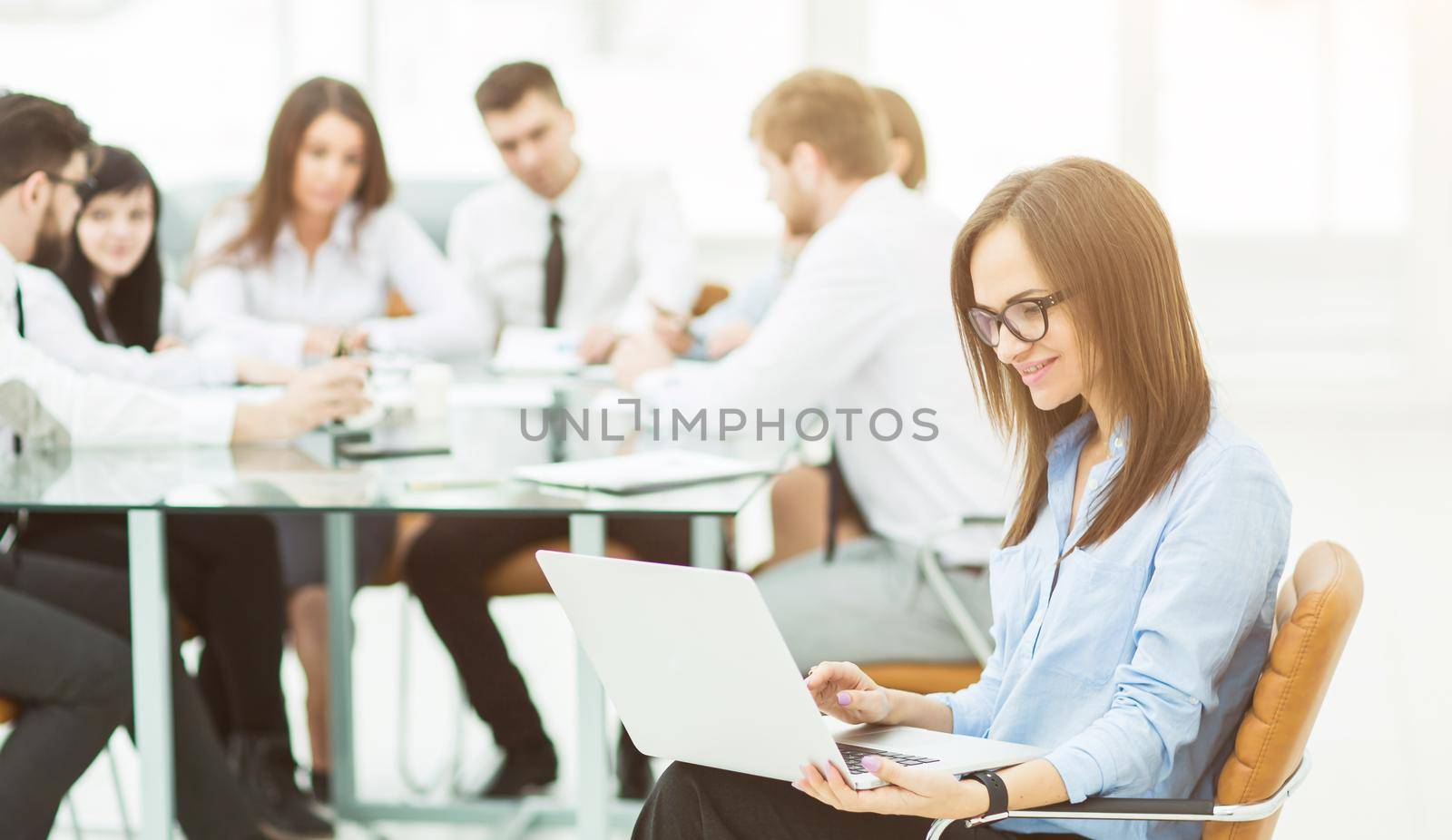 leading lawyer of the company on background, business meeting business partners. the photo has a empty space for your text.