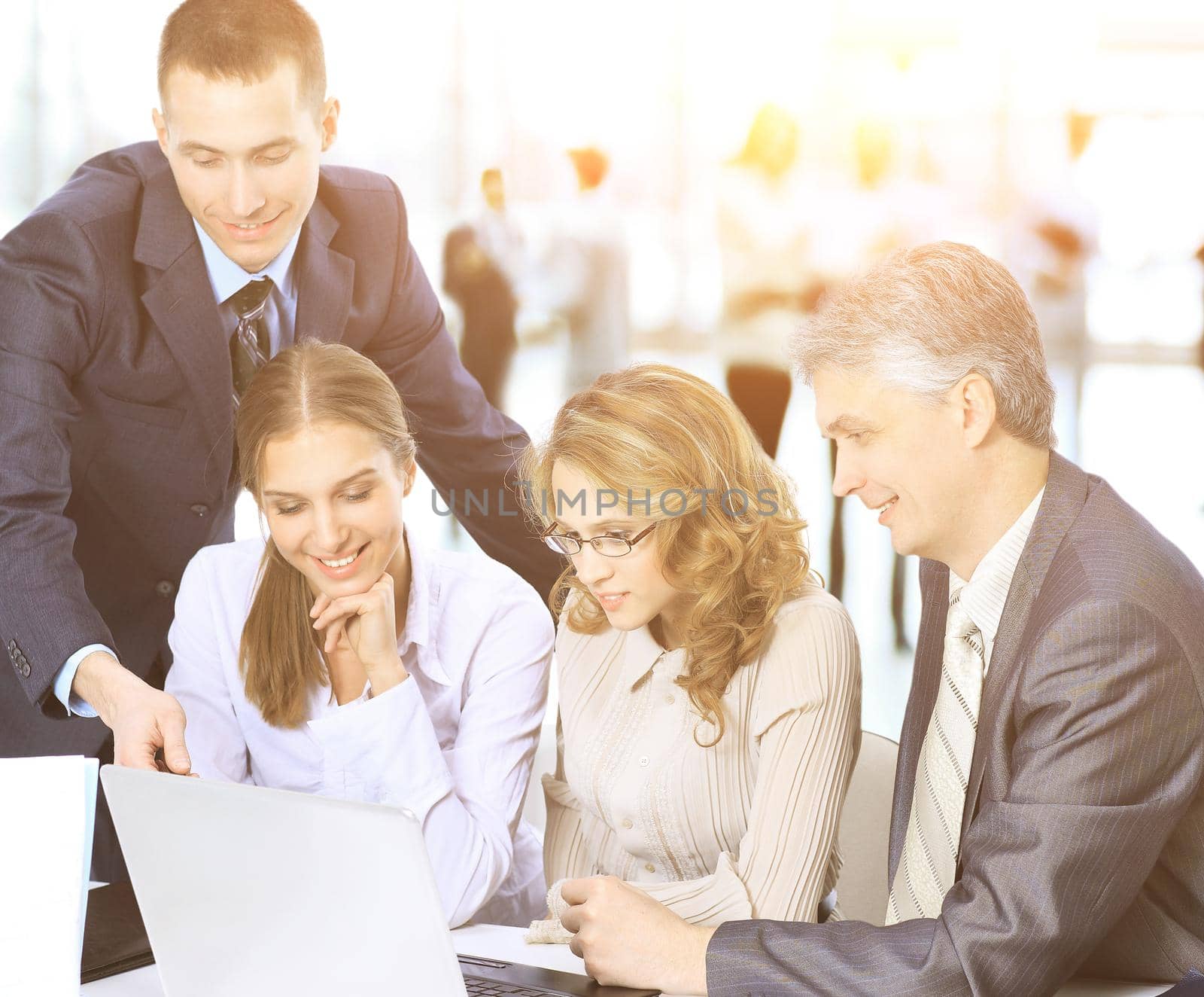 Business meeting - manager discussing work with his colleagues