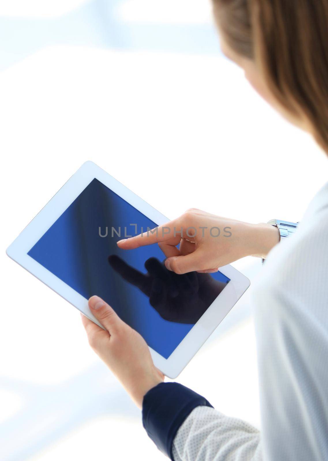 Businesswoman holding digital tablet