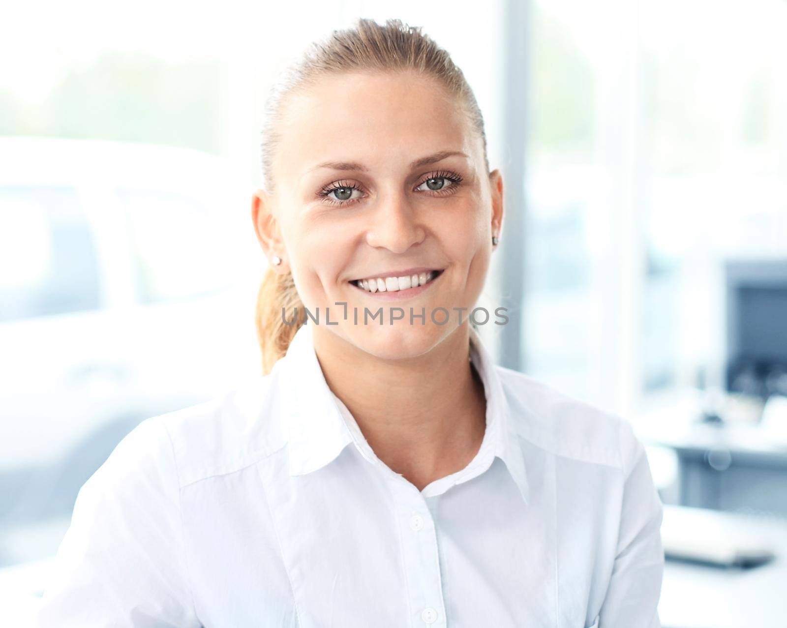 Closeup portrait of cute young business woman smiling