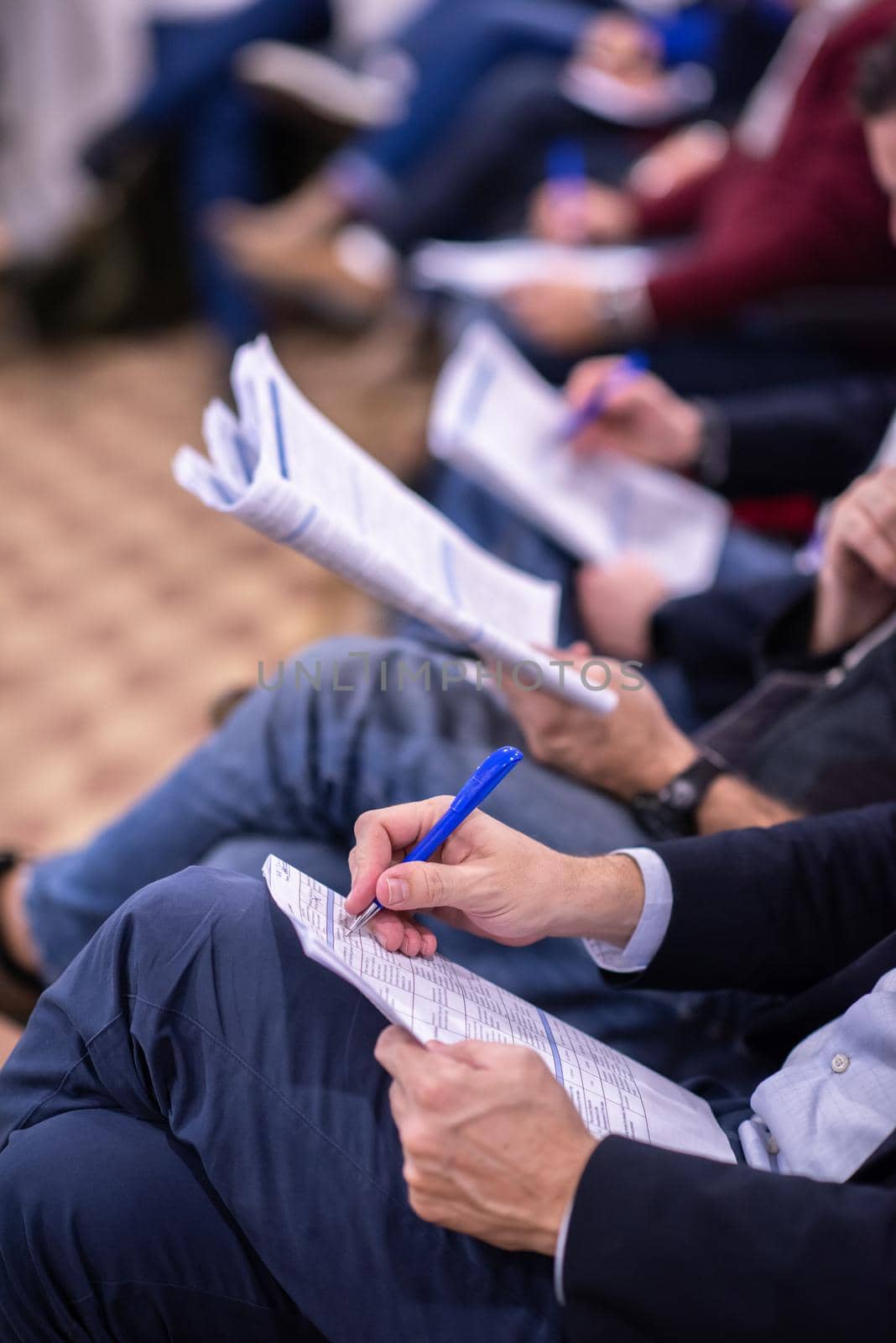 young people taking notes on education training  business seminar at modern conference room