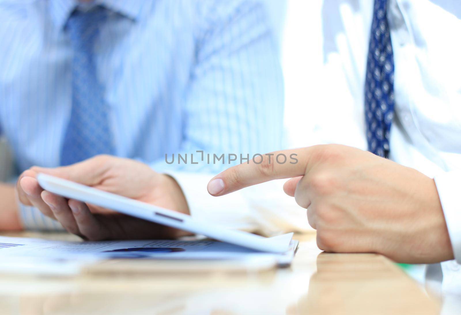 Business adviser analyzing financial figures denoting the progress in the work of the company