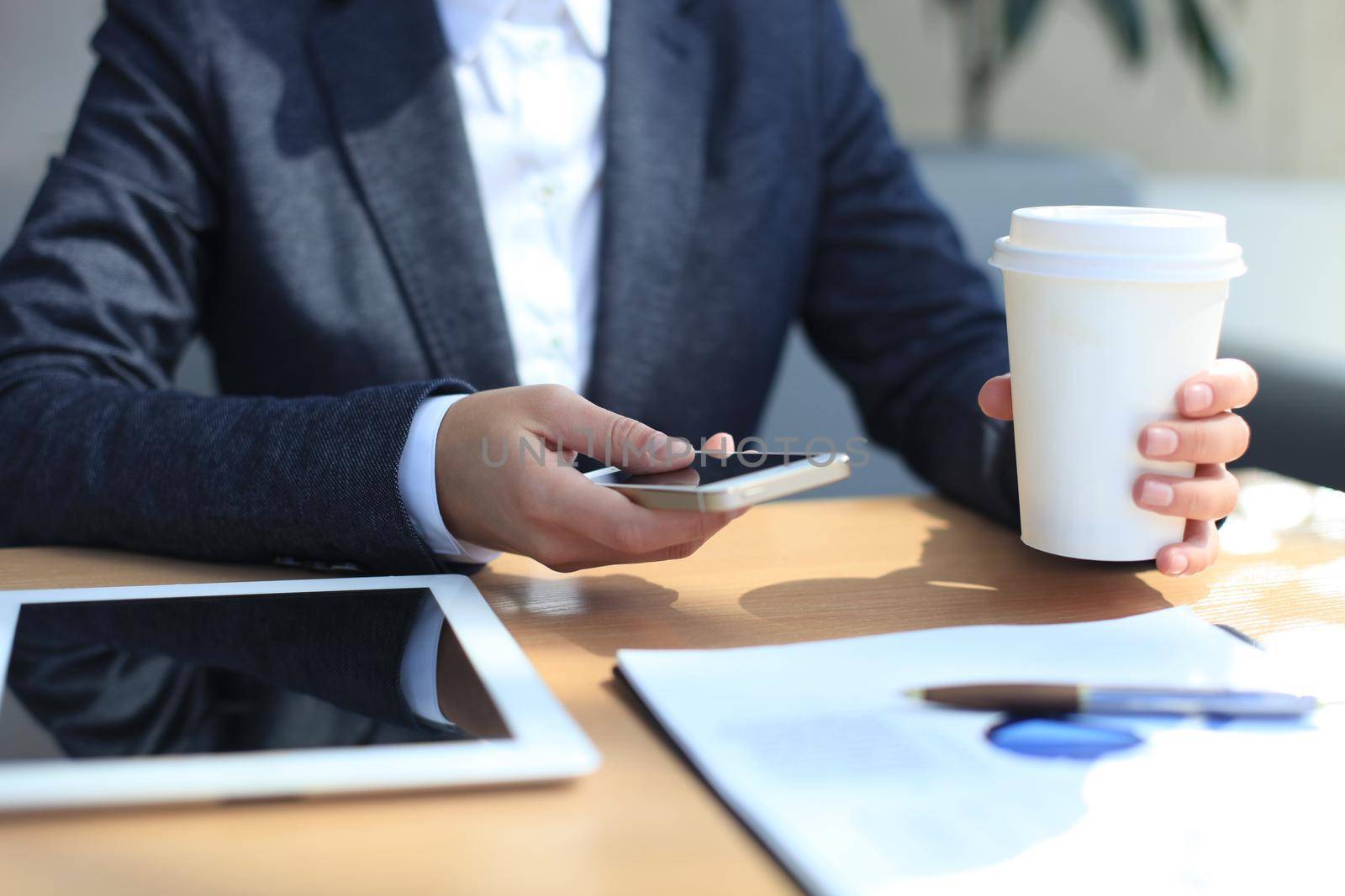 Modern workplace with digital tablet computer and mobile phone