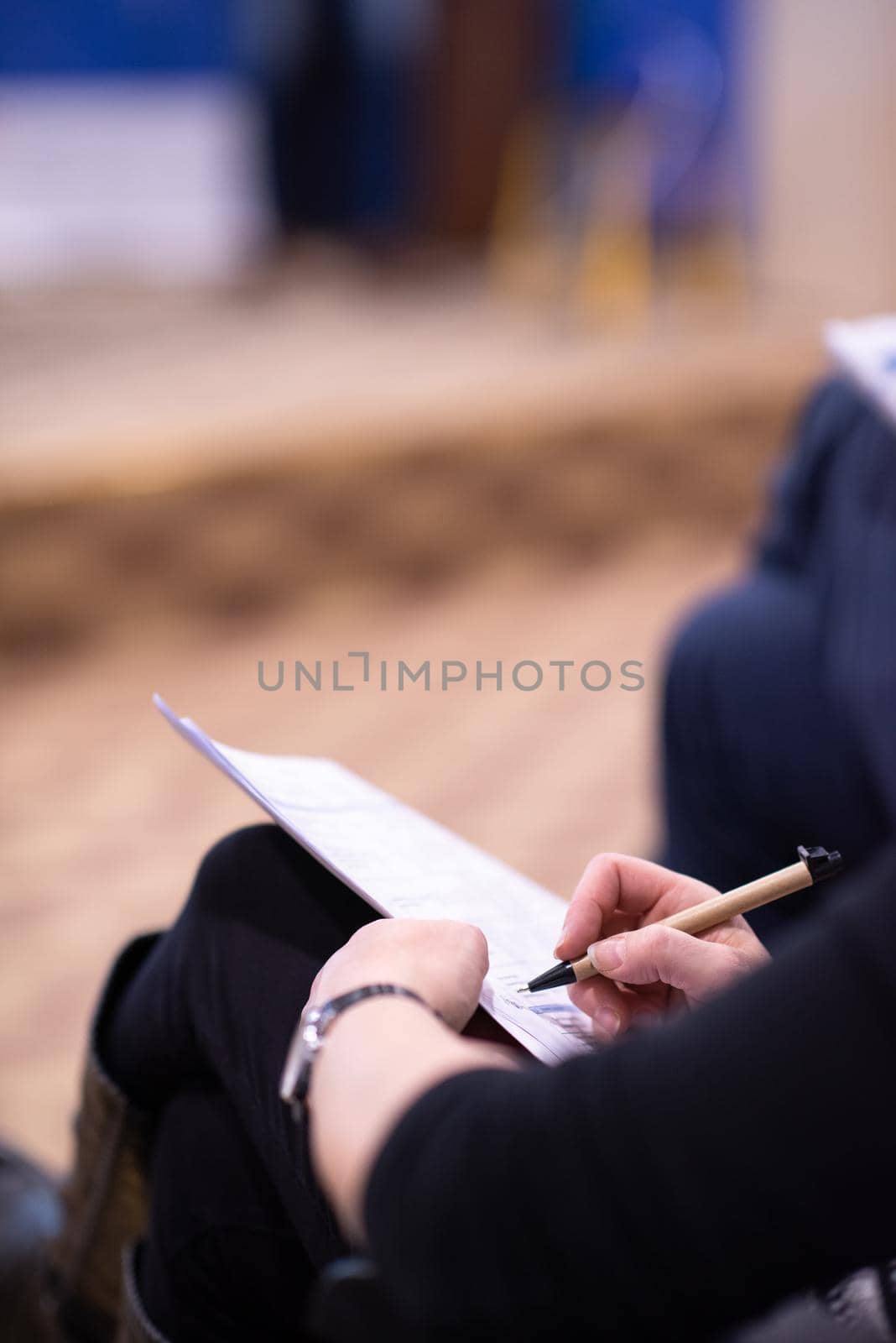 young people taking notes on education training  business seminar at modern conference room