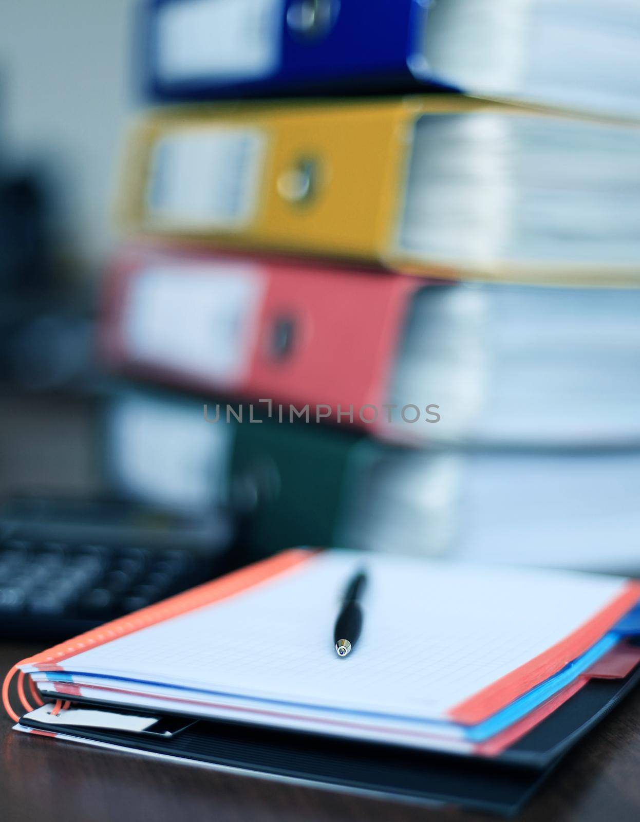 Office supplies and coffee cup on table by tsyhun