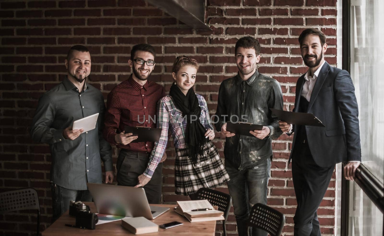 successful business team near the workplace in modern office