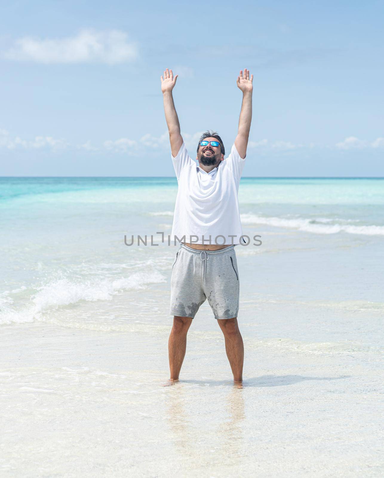 One man is enjoying beautiful tropical beach