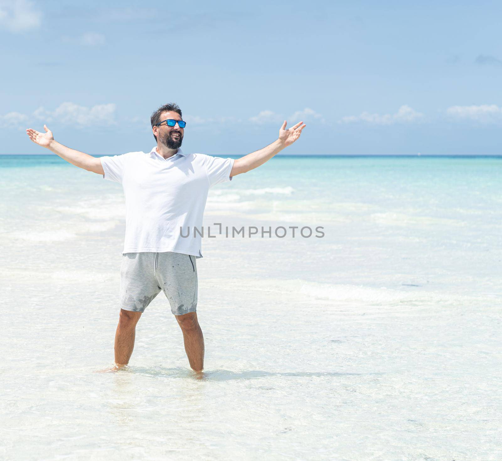 One man is enjoying beautiful tropical beach