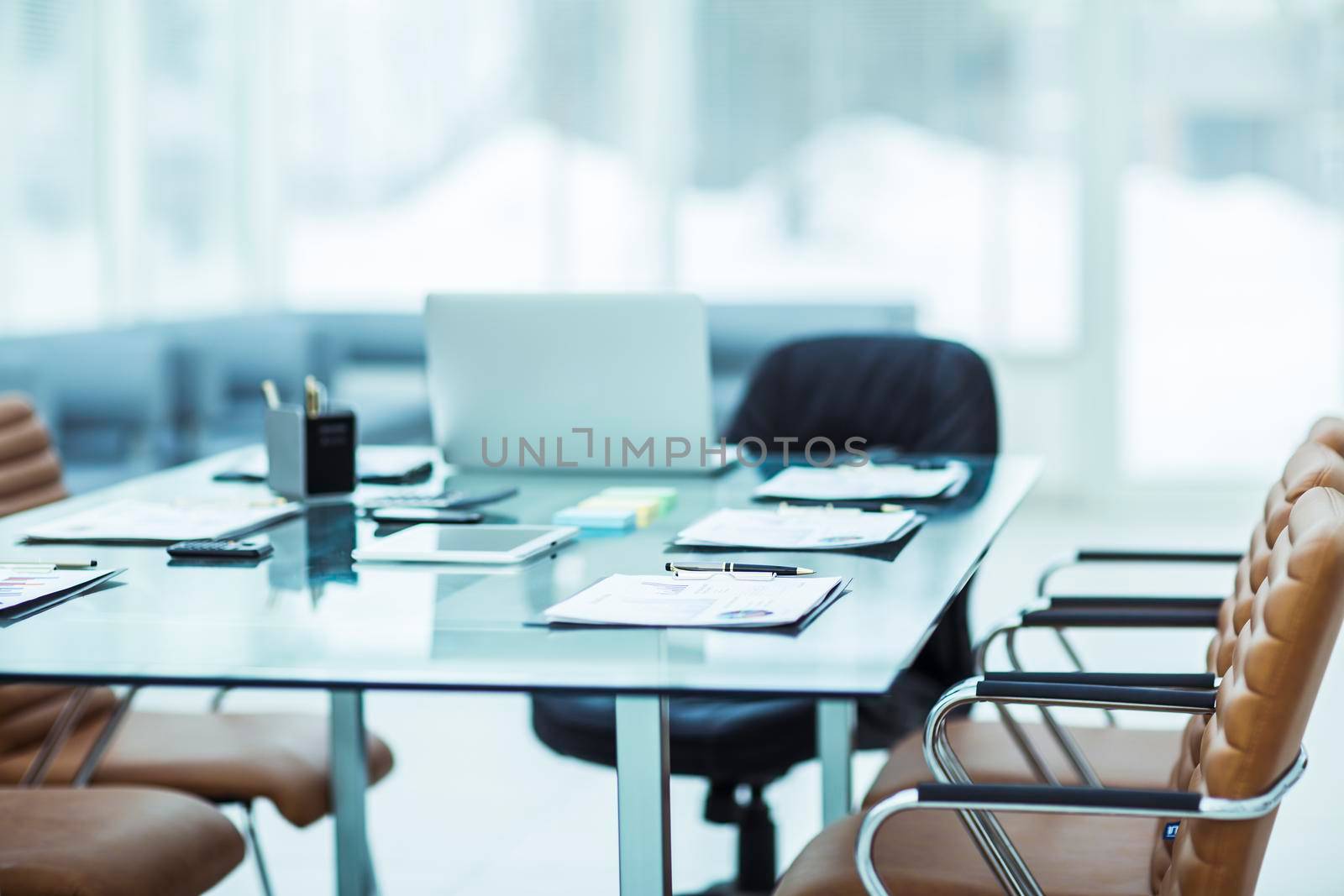 closeup of a Desk with the documents prepared by the beginning of business negotiation.the photo has a empty space for your text