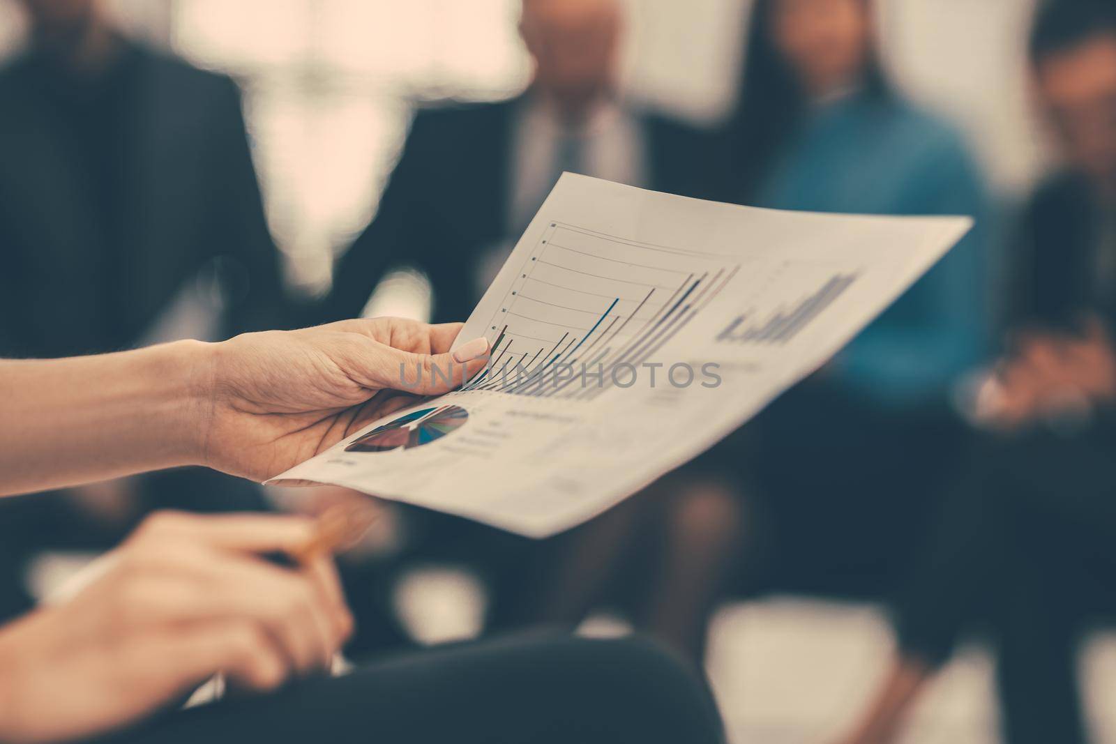 close up. business woman checking a financial document. business concept