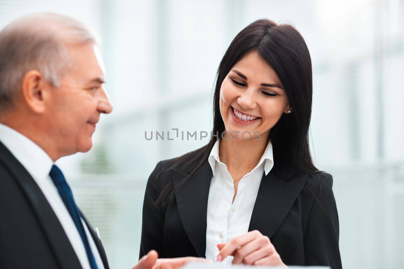 close up. businessman discussing a business document with a consultant. business concept