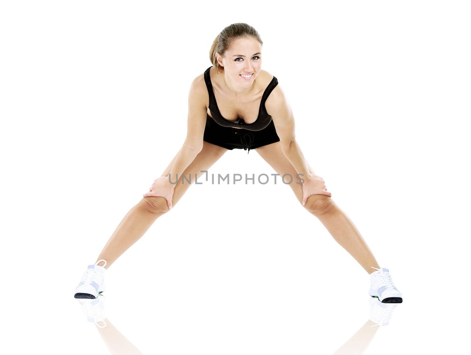 pretty brunette in black active wear, white background by SmartPhotoLab