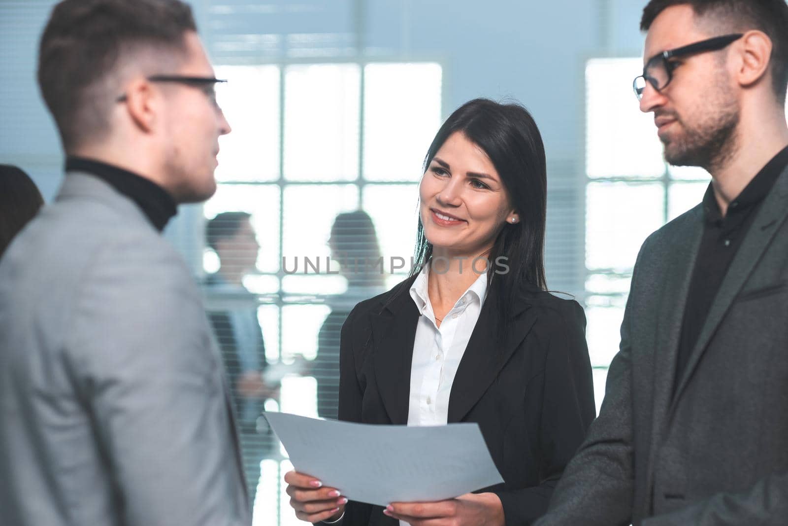 smiling business partners shaking hands with each other. the concept of cooperation