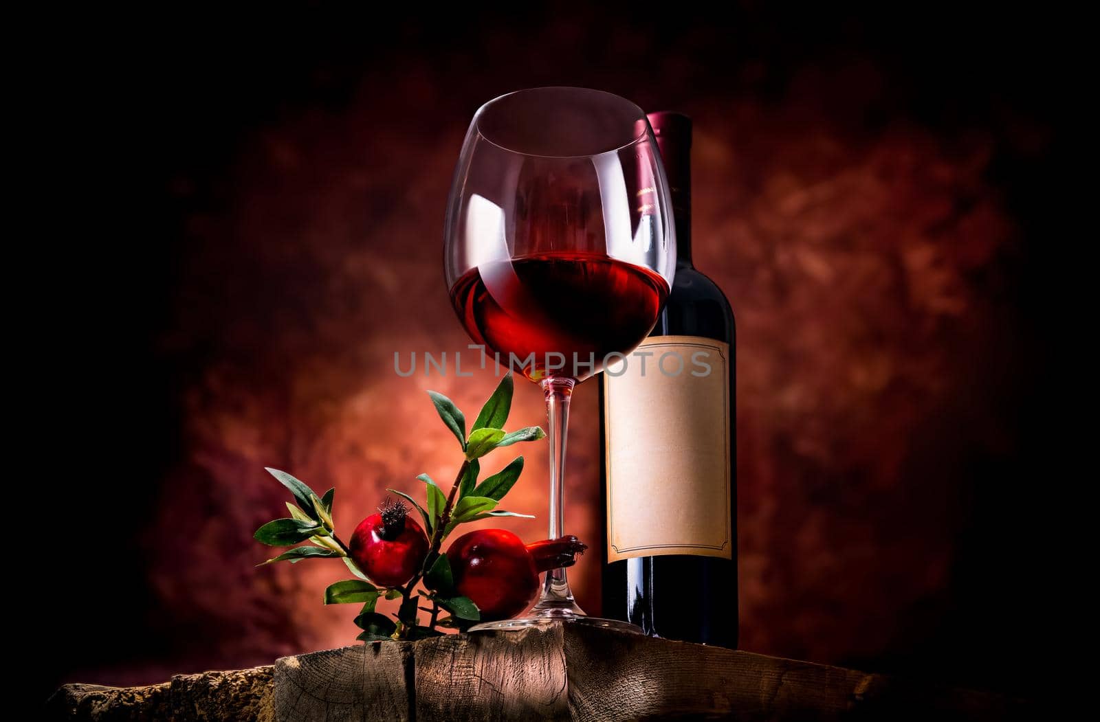 Pomegranate wine on a wooden table in a glass bowl