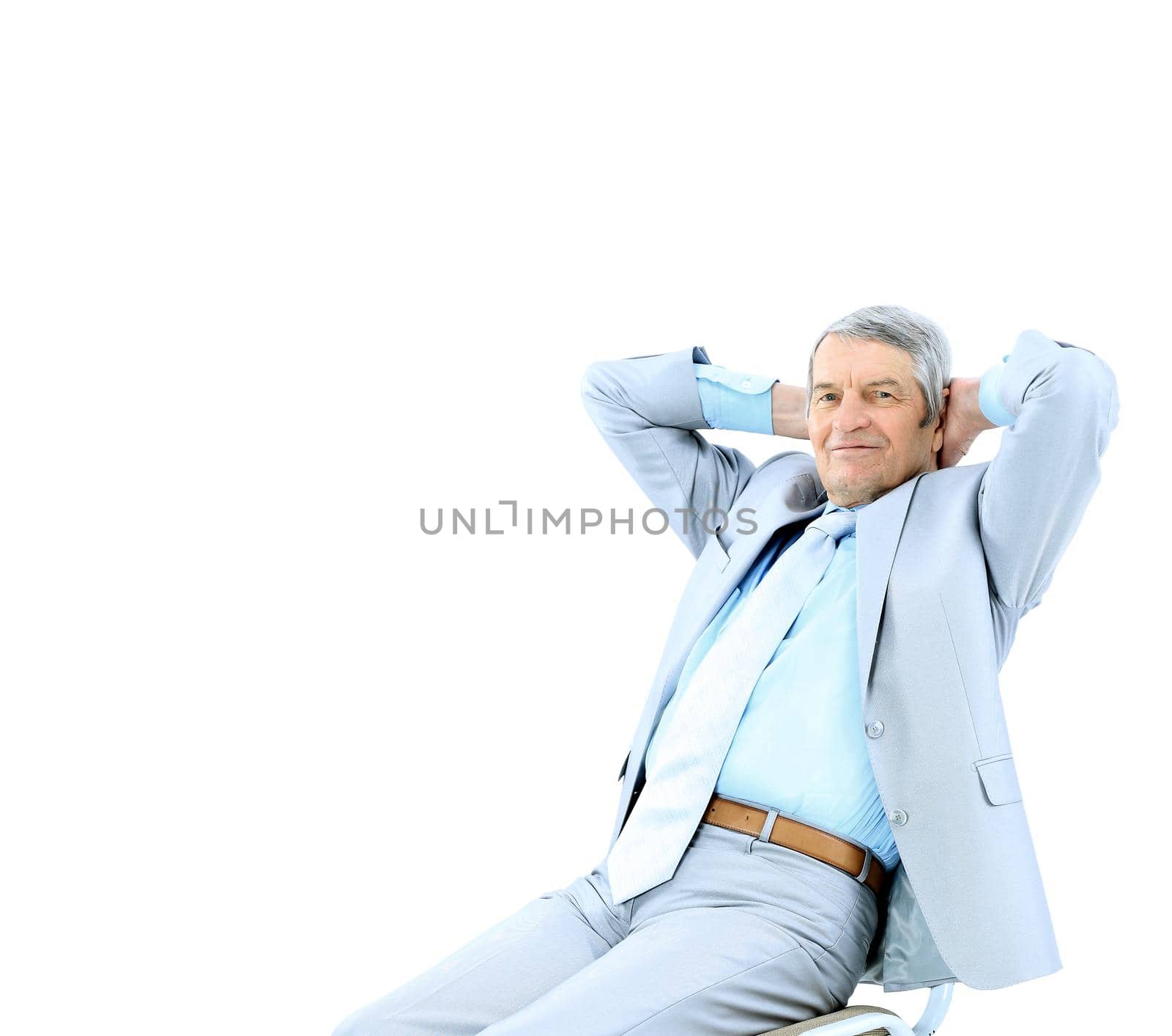 Businessman in age, resting for a break. Isolated on a white background.