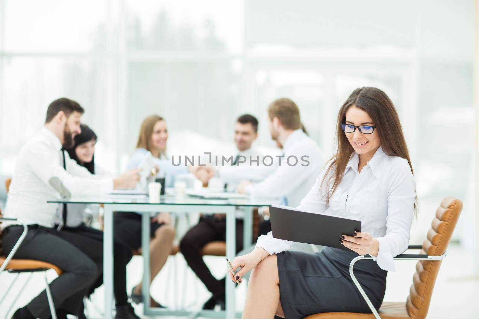 leading lawyer of the company on background, business meeting business partners. the photo has a empty space for your text.