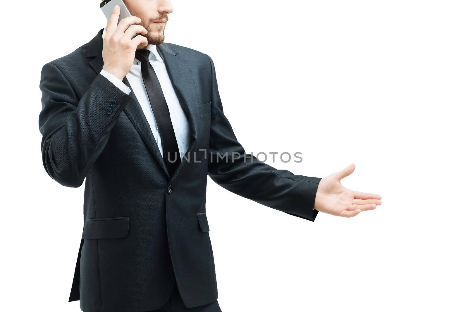 on the left side of the photo - close up of serious businessman talking with a partner on a white background. On the right side of the photo is blank for your text