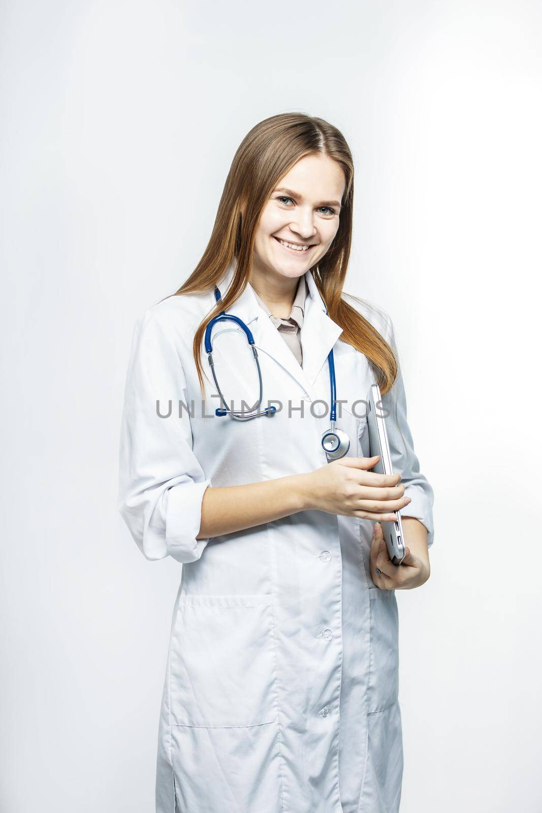family doctor with stethoscope on white background.the photo has a empty space for your text.